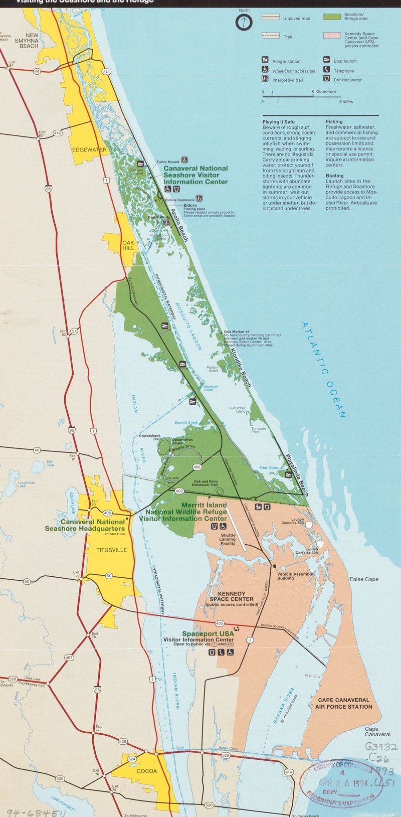 Map of Canaveral National Seashore and Merritt Island National Wildlife Refuge on the Florida coast, with Titusville at lower left, Cocoa near the bottom edge, the Indian River and Mosquito Lagoon in blue, and Black Point Wildlife Drive marked inside the green refuge area.